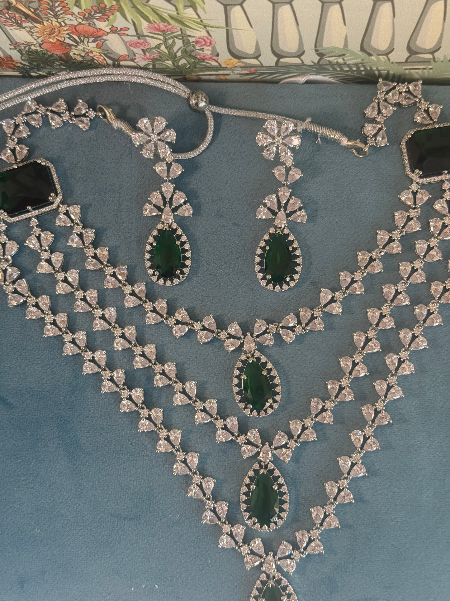AD triple layer with side stone broach