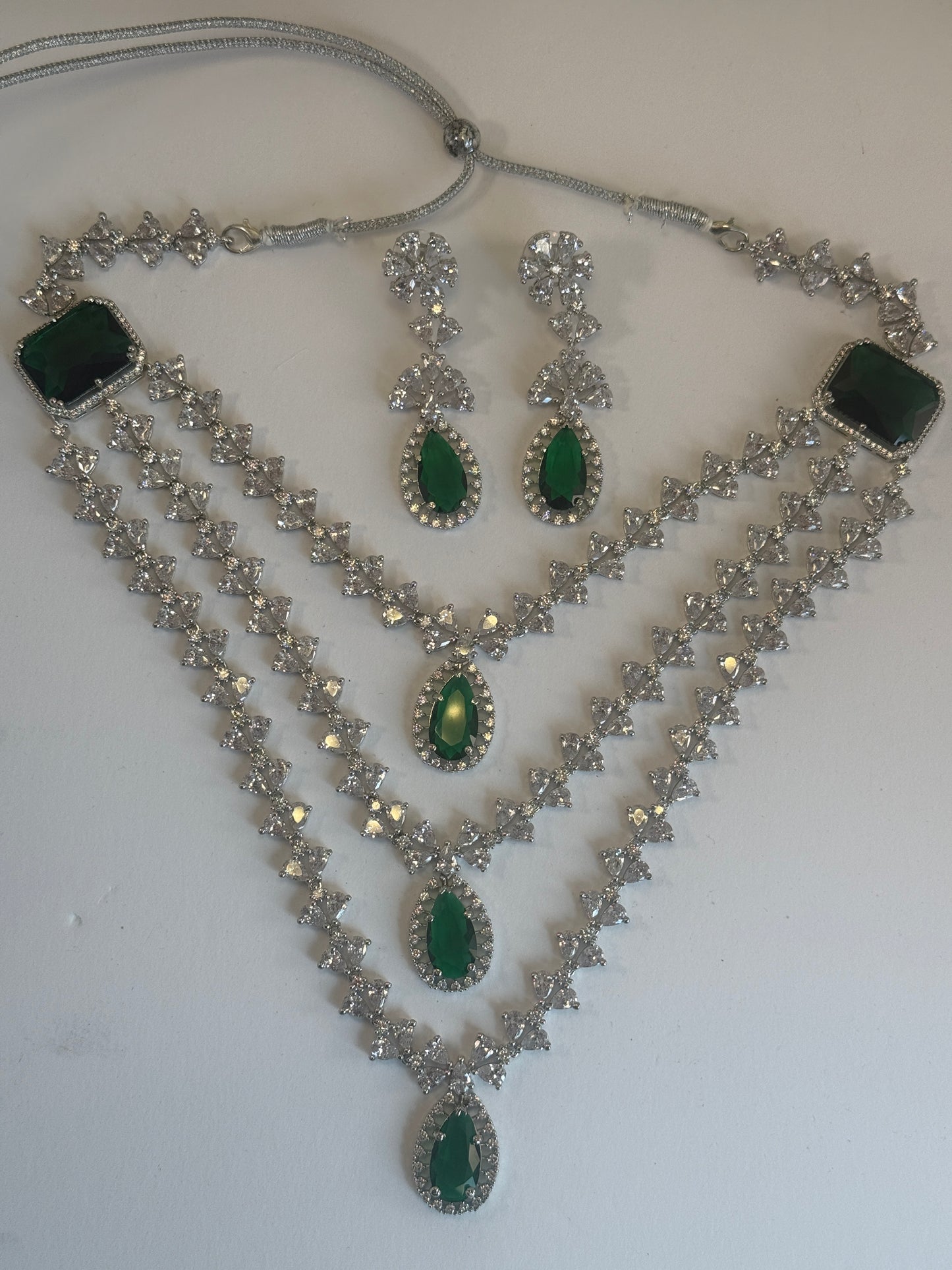 AD triple layer with side stone broach