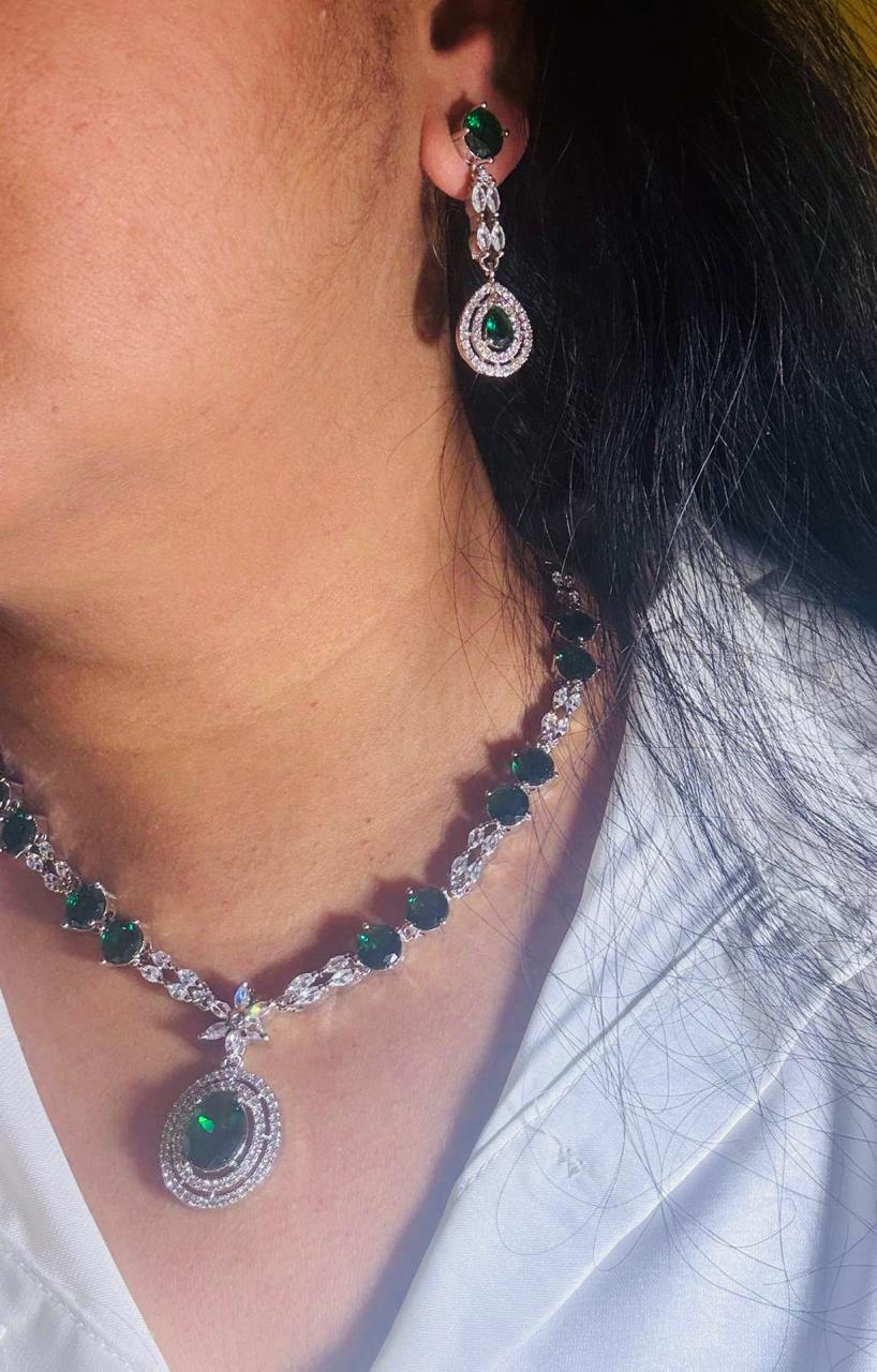 Aadya Luxorious jewelry in Ad and sapphire/ Emerald