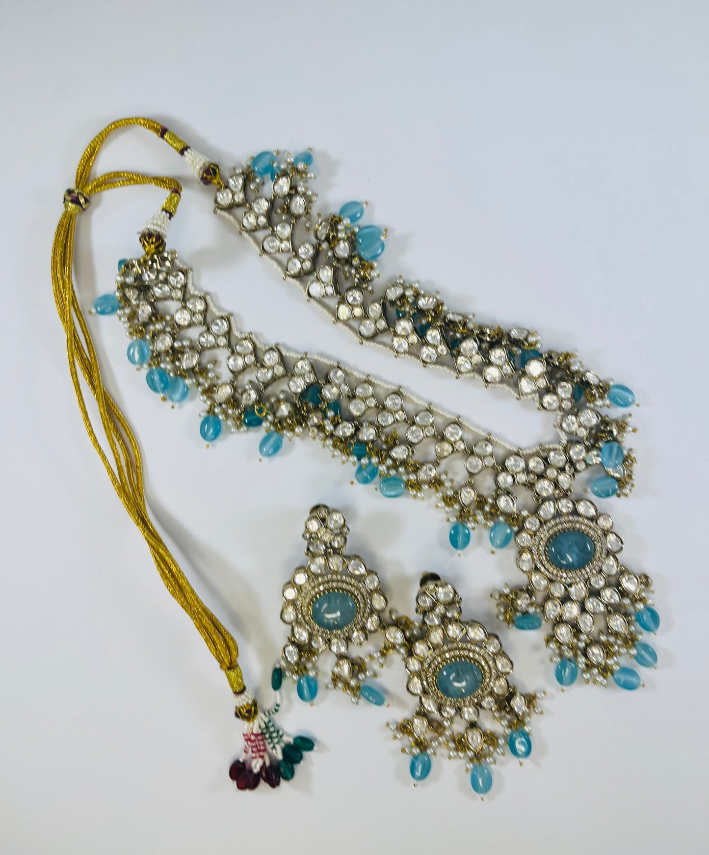 Abhika- Moissanite polki and real blue stone