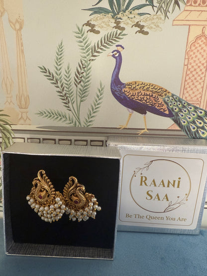 Hansini - swan pearl earrings