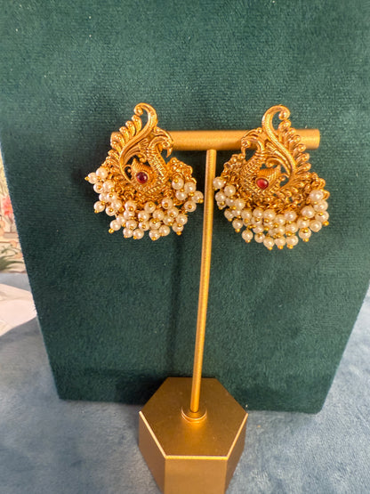 Hansini - swan pearl earrings