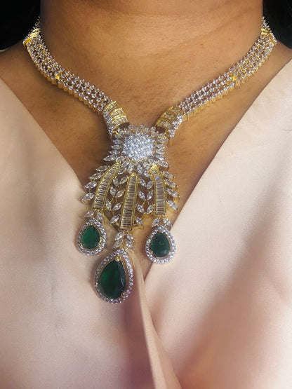 Green stone CZ next to real
