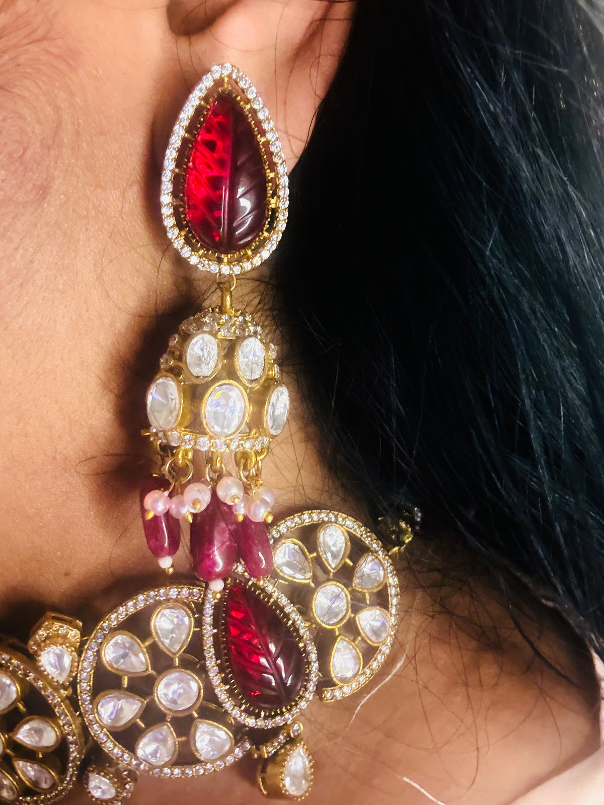 Aadya- carved red stone kundan