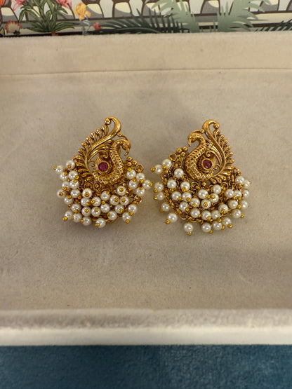 Hansini - swan pearl earrings