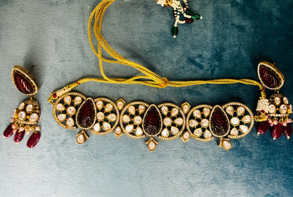 Aadya- carved red stone kundan