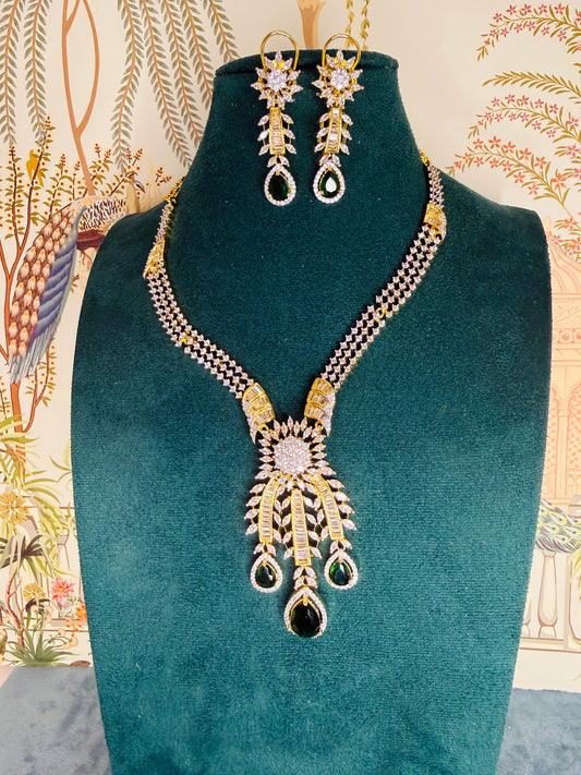Green stone CZ next to real